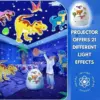 DinoGlow™ LED projektor v obliki dinozavrovega jajca z 21 motivi